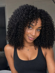 Same Afro Kinky Curly campaign model wearing Natural Black