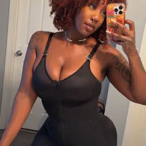 Shopper wearing a reddish brown finger curl wig
