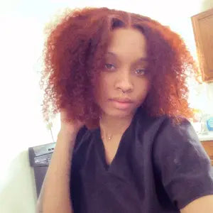 Shopper showing a full 16 inch curl style